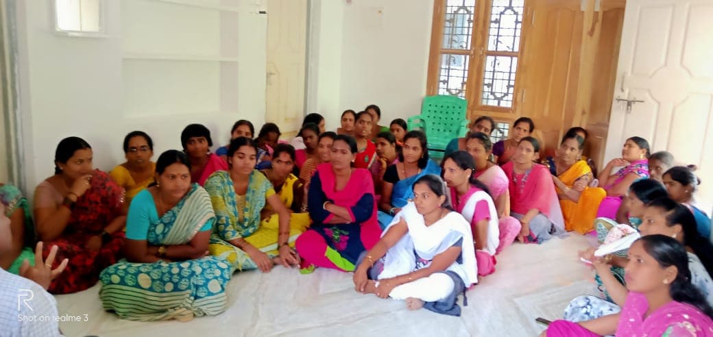 women gathered for a knowledge of healthcare camp organized by AD Life in Telangana.